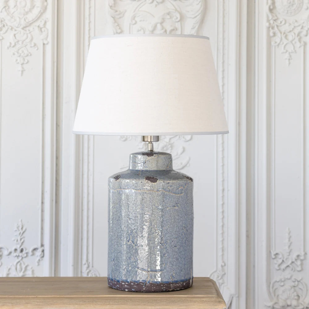 Distressed Blue Ceramic Table Lamp With Cream Linen Shade display
