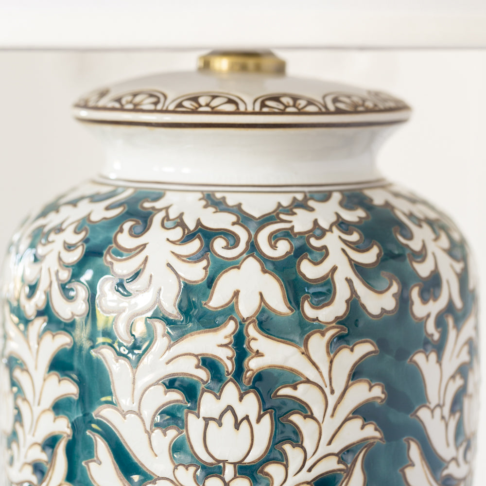 Teal Thistle Design Table Lamp With White Shade close up 