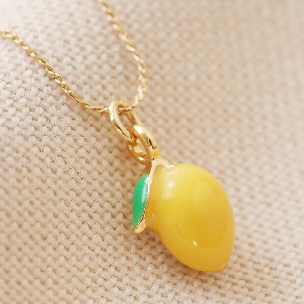 Tiny Coloured Enamel Lemon Charm Gold Necklace close up lemon charm
