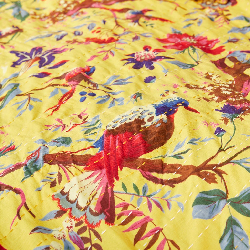 Yellow Throw With Birds Of Paradise Design close up