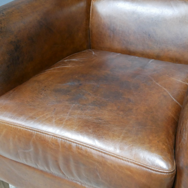 Brown Leather Reading Chair close up seat