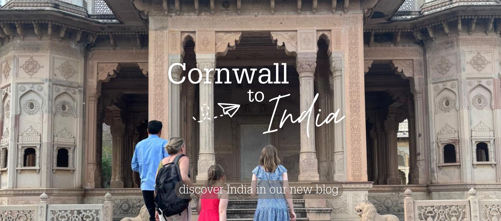 Cornwall to India Blog - Director Jodi and his family on the steps of an Indian temple