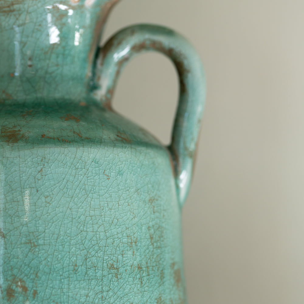 Decorative Tall Teal Vase With Handles close up of handles and rustic finish