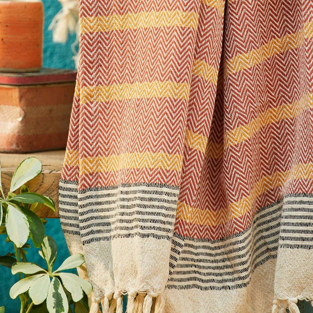 Malabar Woven Bed Cover With Tassels Terracotta close up