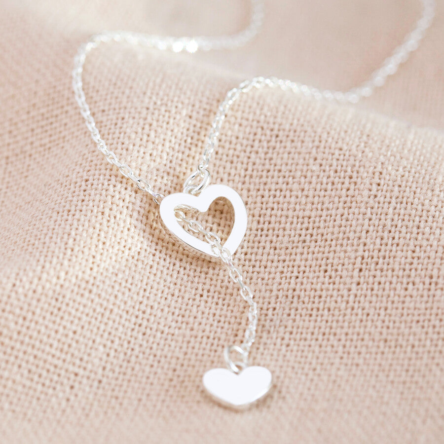 Mismatched Heart Pendant Lariat Necklace close up heart outline pendant
