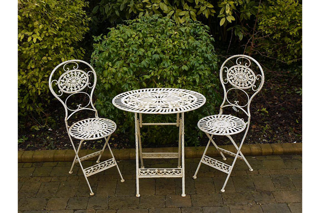 Ornate White Outdoor Oval Table Set For Two