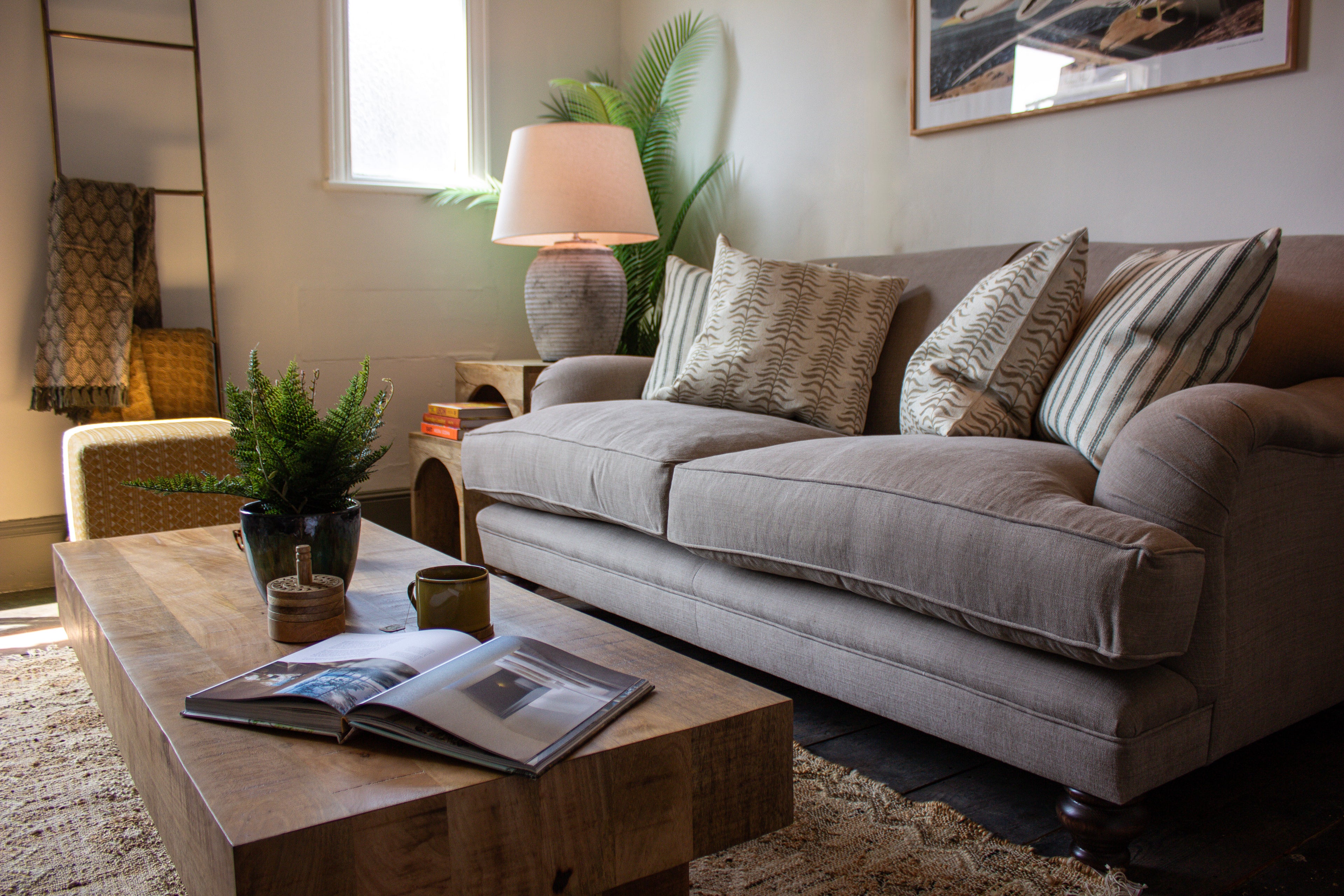 Paulus & Brown Sofa with Block Print Cushions & Mango Wood Furniture Uneeka styled with Coastal Lamp 
