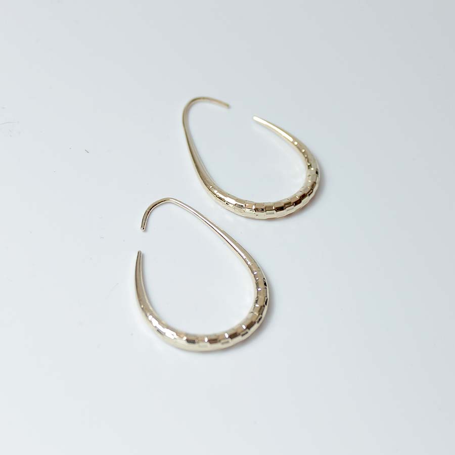 Textured Oval Shape Brass Earrings Gold
