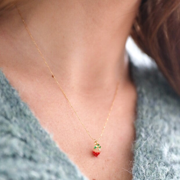 Tiny Coloured Enamel Strawberry Charm Gold Necklace being worn