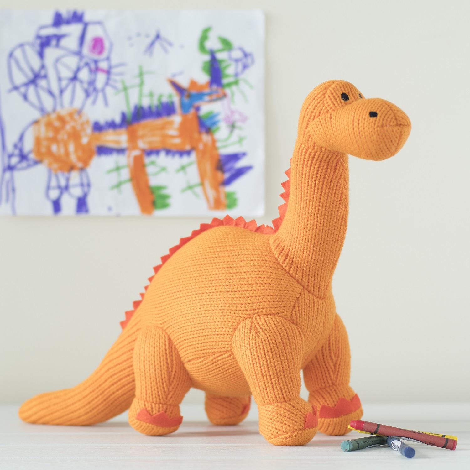 Knitted Orange Diplodocus Dinosaur Baby Soft Toy Uneeka