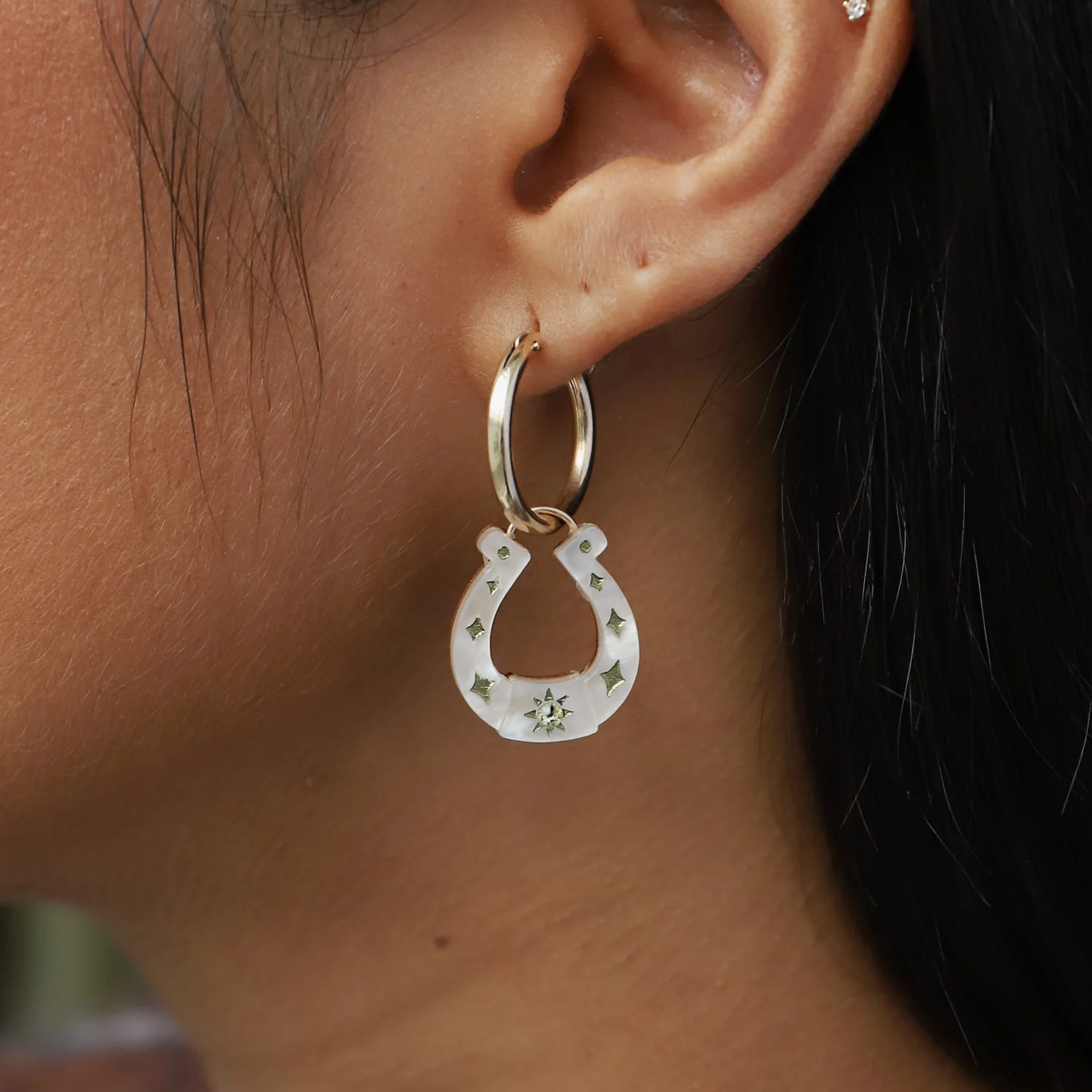 Wolf & Moon Cream Horseshoe Charms - worn as earrings - Uneeka