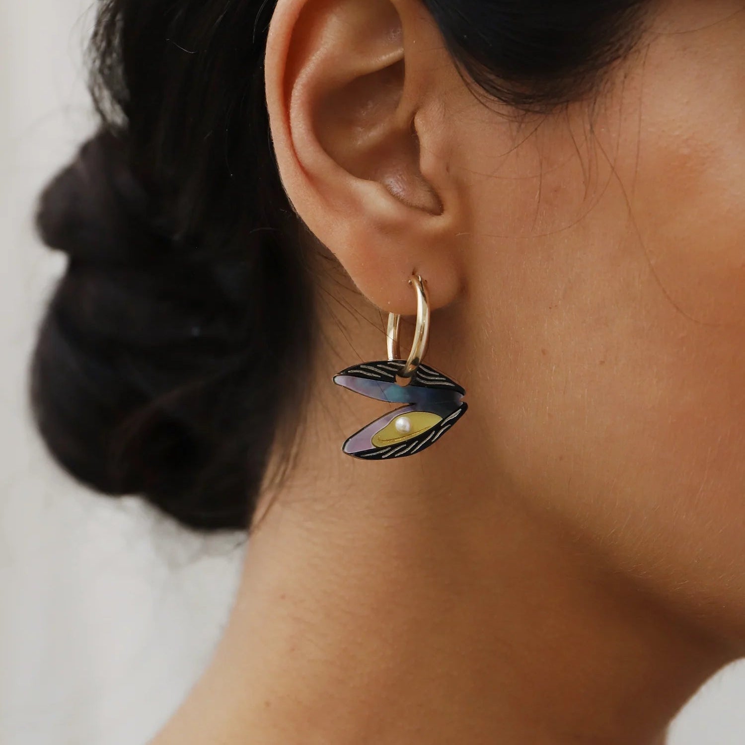 Wolf & Moon Mussel Charms - worn as earrings - Uneeka