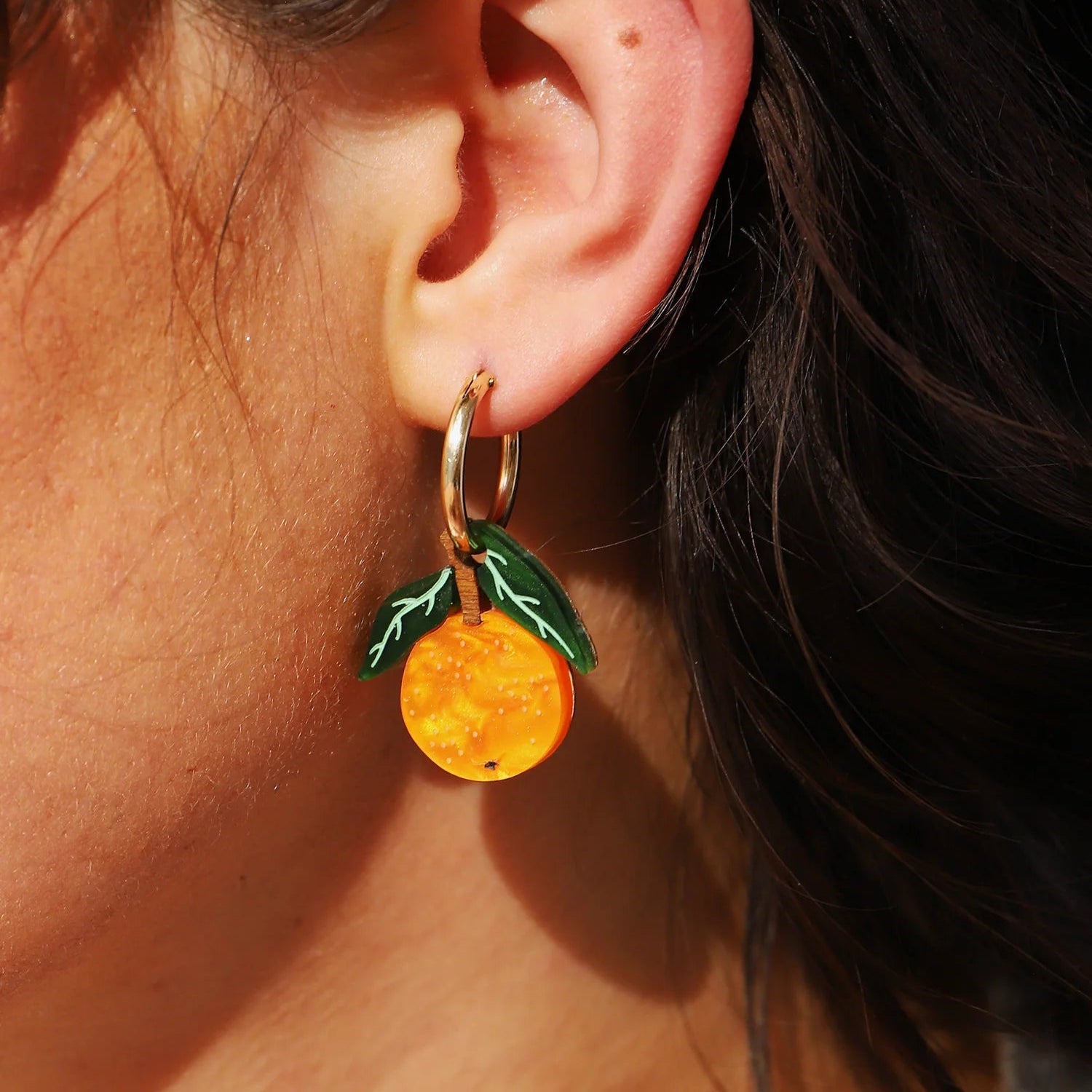 Wolf & Moon Orange Charms - worn as earrings - Uneeka