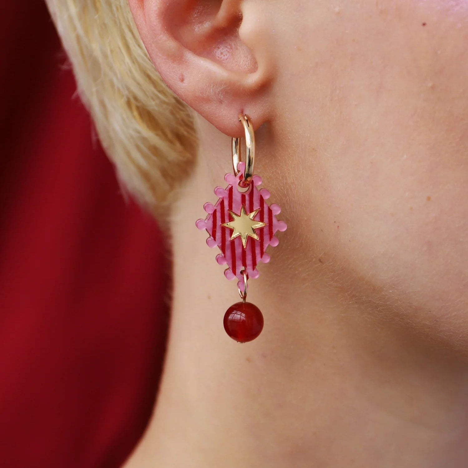Wolf & Moon Rose Cirque Charms - worn as earrings - Uneeka