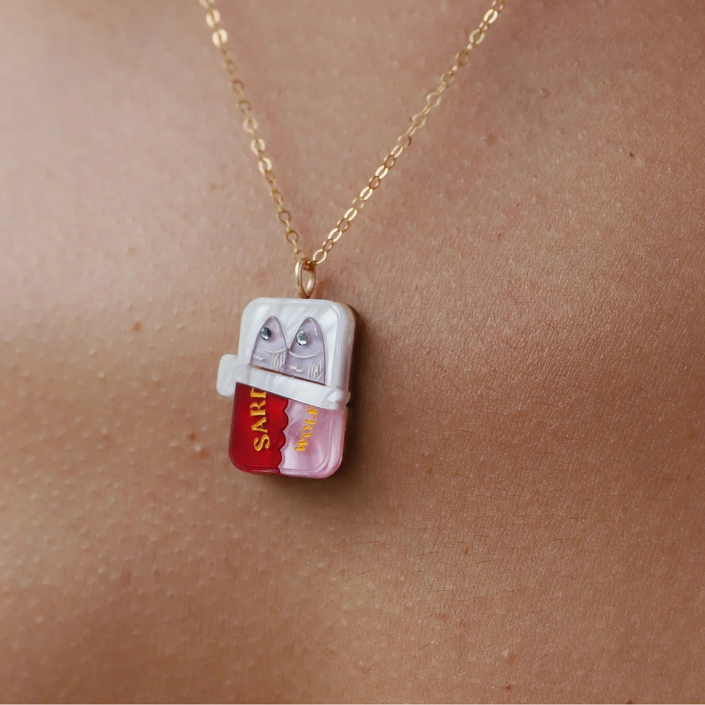 Wolf & Moon Sardine Charms - worn as a necklace - Uneeka