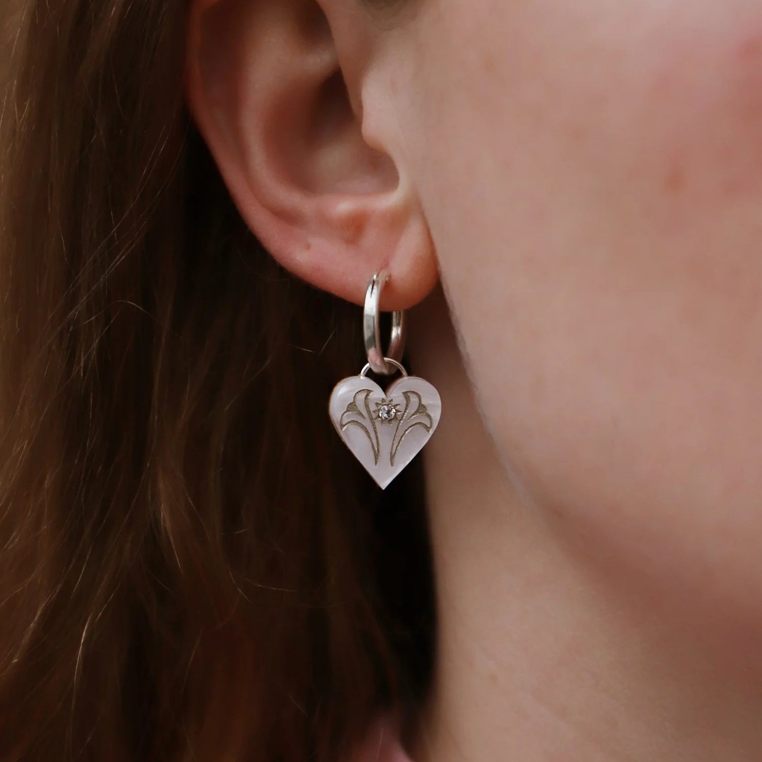Wolf & Moon White Heart Charms - worn as earrings - Uneeka