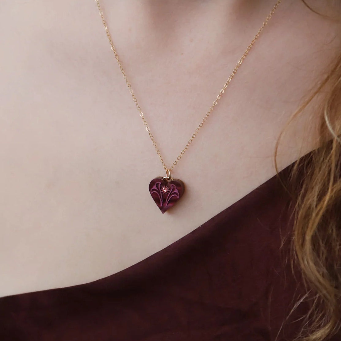 Wolf & Moon Maroon Heart Charms - worn as a necklace - Uneeka