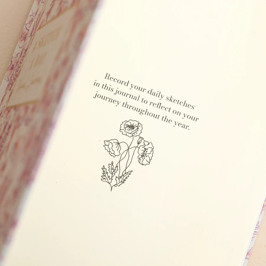 'A Sketch a Day' pink floral pink open notebook with floral design on a beige background 79990 Uneeka