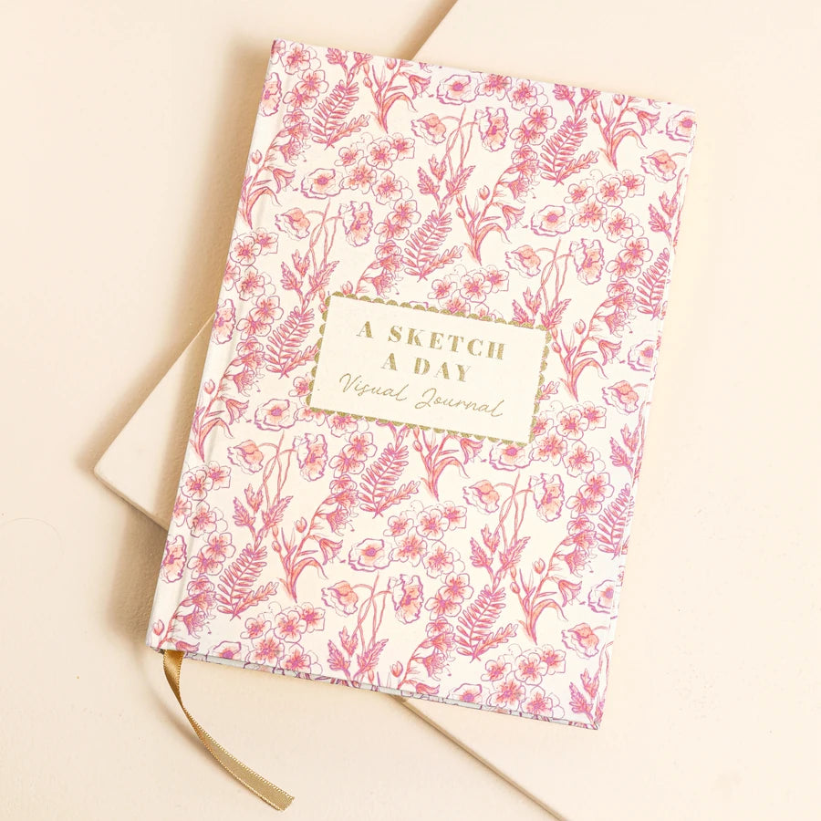 'A Sketch a Day' pink floral notebook with text on a beige background 79990 Uneeka