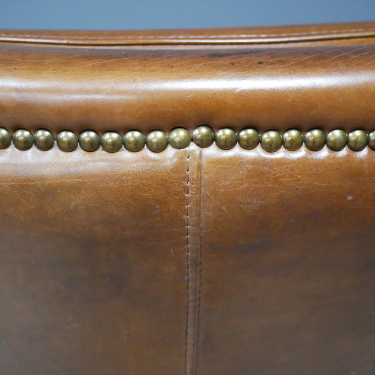 Brown Leather Reading Chair gold brass beaded detail