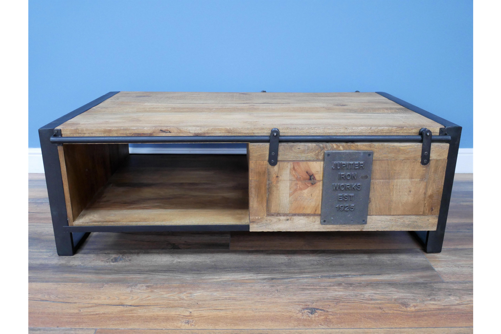 Industrial coffee table, This black framed wooden coffee table as a very industrial look to add interest to any room.