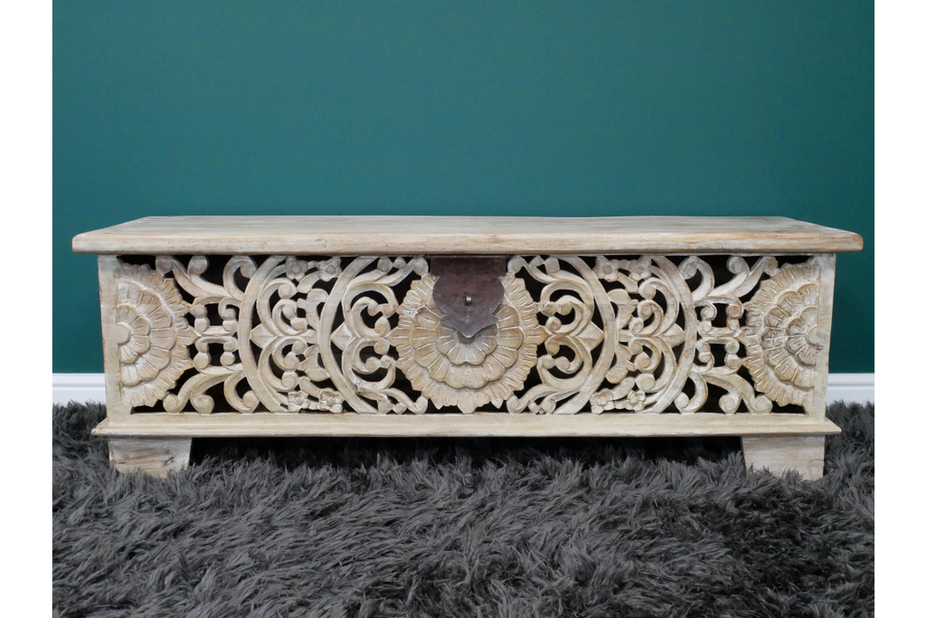 A lovely ornate carved wooden storage bench, this piece would add a unique touch to your bedroom, living room or hallway as a versatile storage solution. 