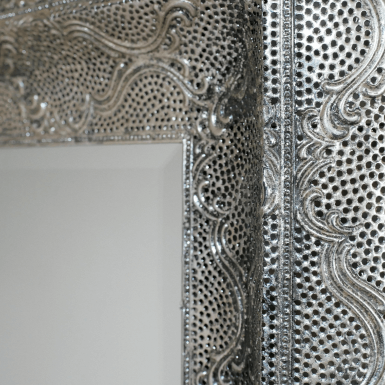 Ornate Metal Mirror Detail