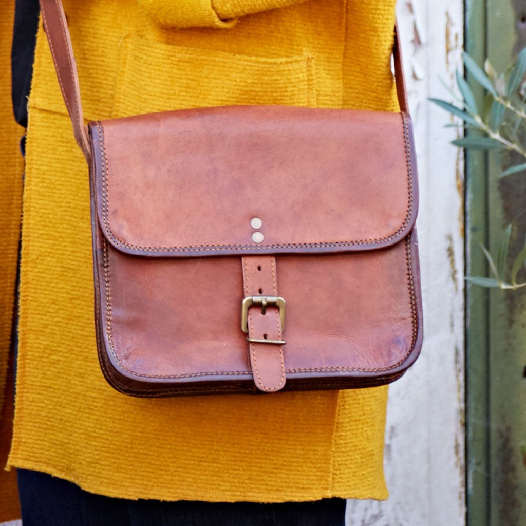 Small Brown Leather Crossbody Bag, Secured with a traditional gold buckle